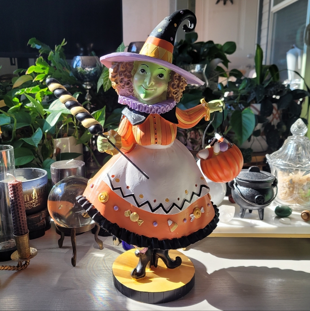 Charming Halloween Witch Figurine with Orange and Black Details